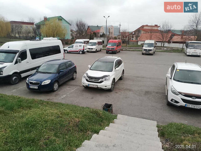 Белый Хонда СРВ, объемом двигателя 2.2 л и пробегом 228 тыс. км за 13300 $, фото 1 на Automoto.ua