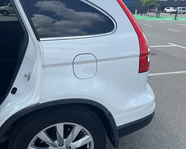 Белый Хонда СРВ, объемом двигателя 2 л и пробегом 171 тыс. км за 15000 $, фото 12 на Automoto.ua