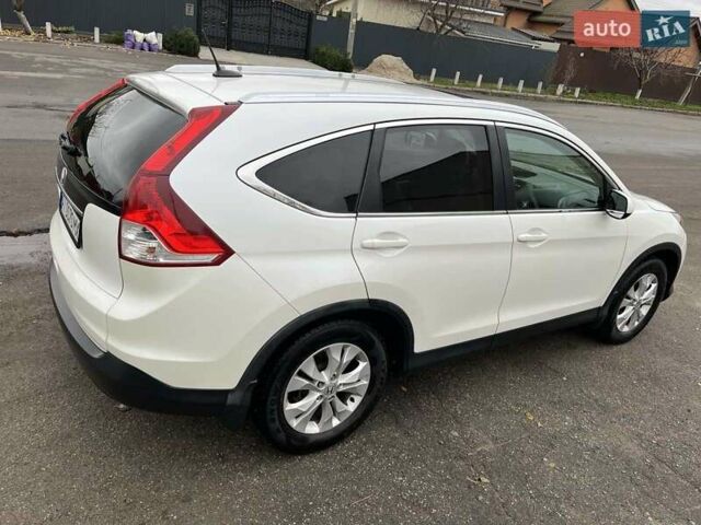 Белый Хонда СРВ, объемом двигателя 2.36 л и пробегом 124 тыс. км за 15200 $, фото 2 на Automoto.ua