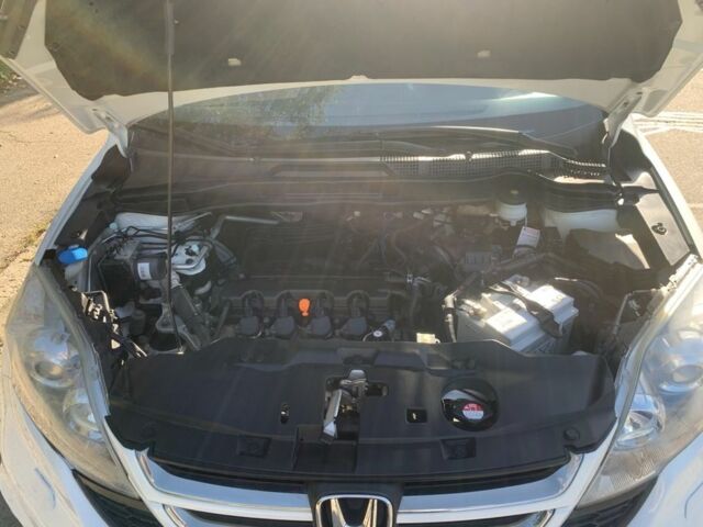 Белый Хонда СРВ, объемом двигателя 2 л и пробегом 165 тыс. км за 11700 $, фото 6 на Automoto.ua