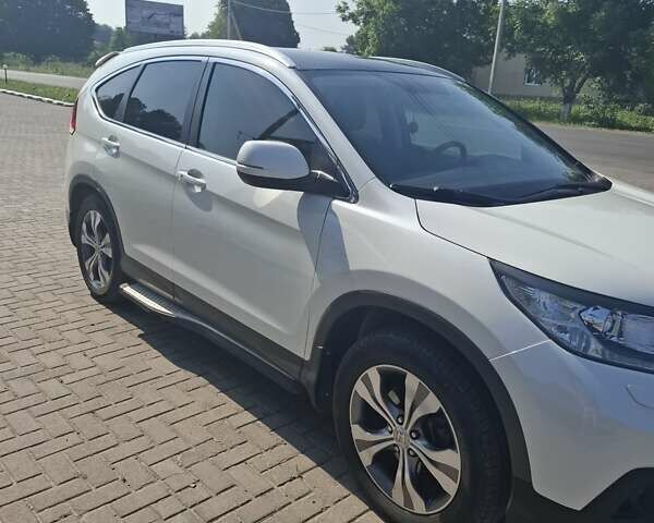Белый Хонда СРВ, объемом двигателя 2.2 л и пробегом 270 тыс. км за 16500 $, фото 2 на Automoto.ua