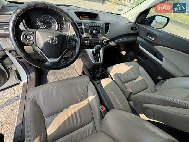 Белый Хонда СРВ, объемом двигателя 2.35 л и пробегом 182 тыс. км за 17000 $, фото 11 на Automoto.ua