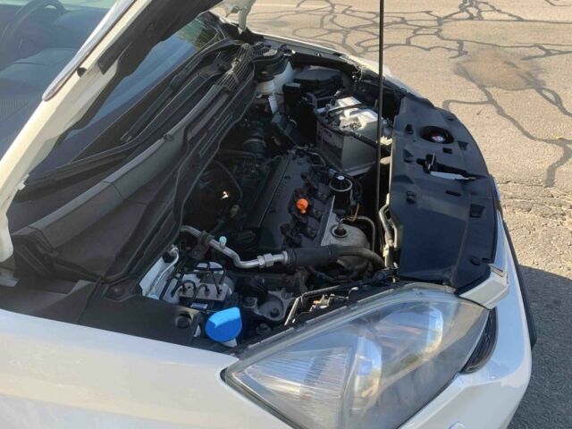 Белый Хонда СРВ, объемом двигателя 2 л и пробегом 165 тыс. км за 11700 $, фото 5 на Automoto.ua