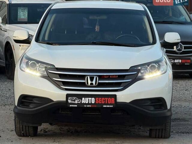 Белый Хонда СРВ, объемом двигателя 2.35 л и пробегом 175 тыс. км за 16500 $, фото 3 на Automoto.ua