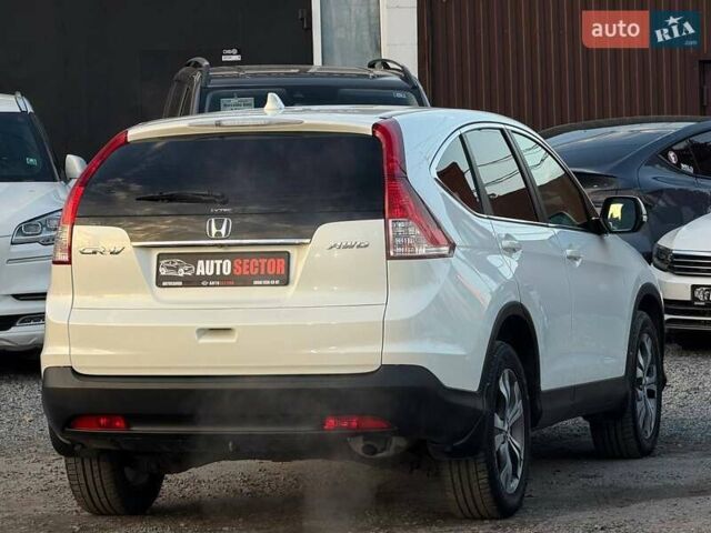 Белый Хонда СРВ, объемом двигателя 2.35 л и пробегом 175 тыс. км за 16500 $, фото 9 на Automoto.ua