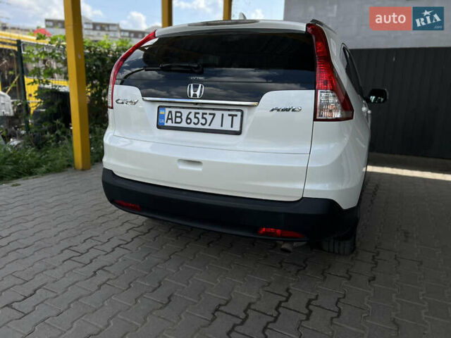 Белый Хонда СРВ, объемом двигателя 2.35 л и пробегом 222 тыс. км за 16100 $, фото 2 на Automoto.ua