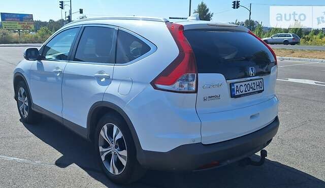 Белый Хонда СРВ, объемом двигателя 2.2 л и пробегом 238 тыс. км за 16500 $, фото 4 на Automoto.ua