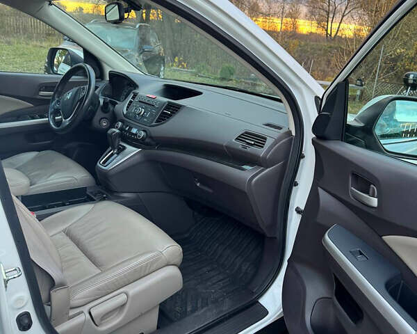 Білий Хонда СРВ, об'ємом двигуна 2.35 л та пробігом 86 тис. км за 17000 $, фото 16 на Automoto.ua