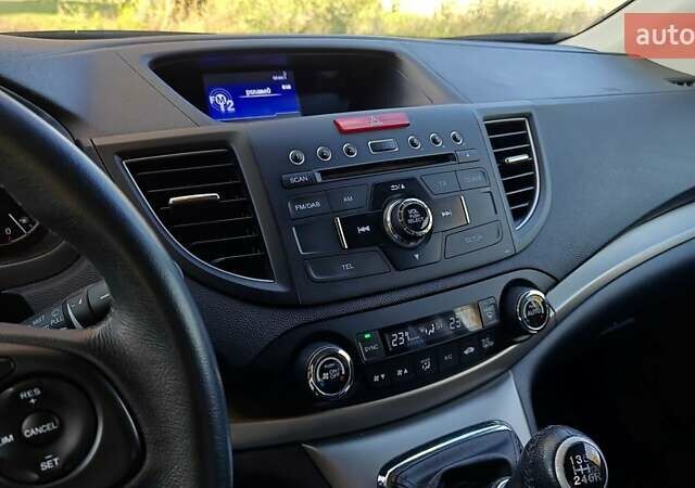 Белый Хонда СРВ, объемом двигателя 2.2 л и пробегом 260 тыс. км за 14700 $, фото 4 на Automoto.ua