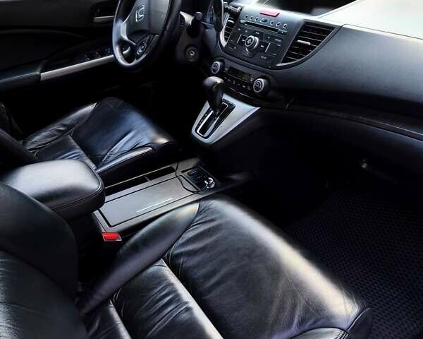 Белый Хонда СРВ, объемом двигателя 2.35 л и пробегом 200 тыс. км за 16000 $, фото 7 на Automoto.ua