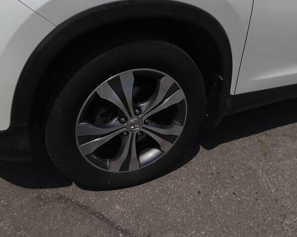 Белый Хонда СРВ, объемом двигателя 2.35 л и пробегом 200 тыс. км за 16000 $, фото 2 на Automoto.ua