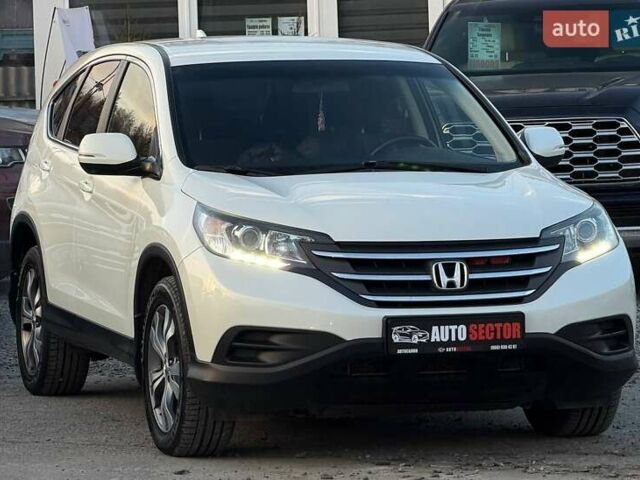 Белый Хонда СРВ, объемом двигателя 2.35 л и пробегом 175 тыс. км за 16500 $, фото 4 на Automoto.ua