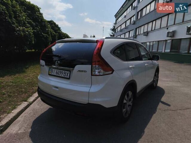 Белый Хонда СРВ, объемом двигателя 2.35 л и пробегом 200 тыс. км за 16000 $, фото 6 на Automoto.ua