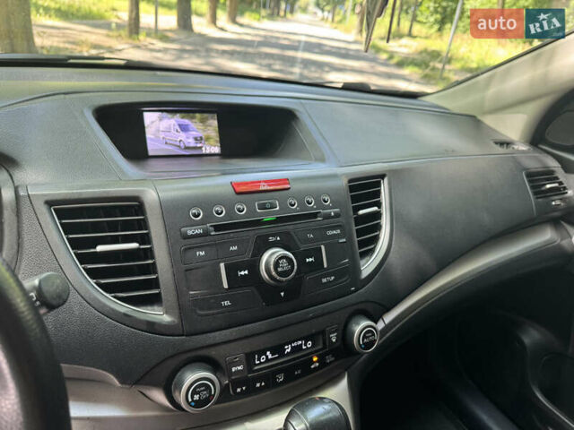 Белый Хонда СРВ, объемом двигателя 2.35 л и пробегом 200 тыс. км за 15500 $, фото 17 на Automoto.ua