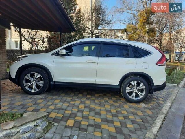 Белый Хонда СРВ, объемом двигателя 2.35 л и пробегом 129 тыс. км за 19000 $, фото 6 на Automoto.ua