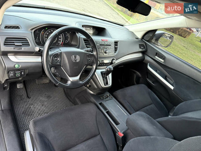 Белый Хонда СРВ, объемом двигателя 2.35 л и пробегом 167 тыс. км за 15500 $, фото 17 на Automoto.ua