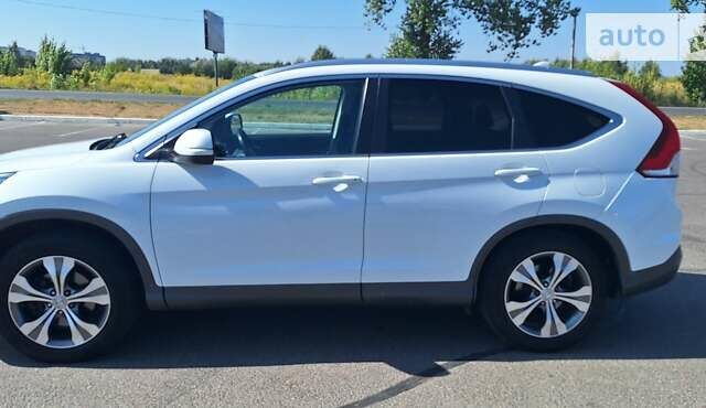 Белый Хонда СРВ, объемом двигателя 2.2 л и пробегом 238 тыс. км за 16500 $, фото 2 на Automoto.ua