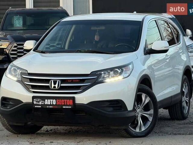 Белый Хонда СРВ, объемом двигателя 2.35 л и пробегом 175 тыс. км за 16500 $, фото 1 на Automoto.ua