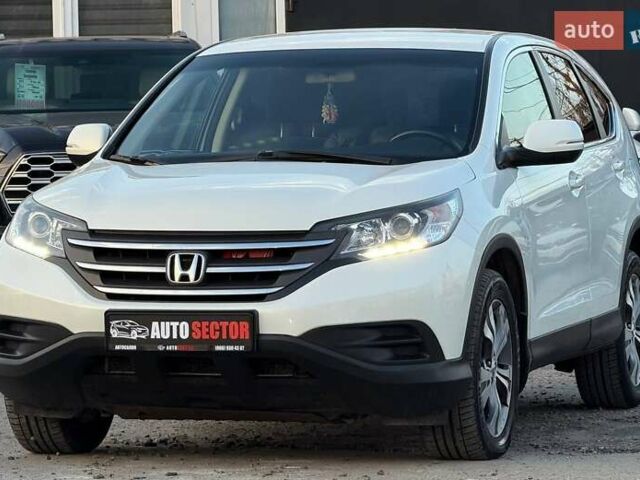 Белый Хонда СРВ, объемом двигателя 2.35 л и пробегом 175 тыс. км за 16500 $, фото 2 на Automoto.ua