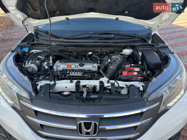 Белый Хонда СРВ, объемом двигателя 2.35 л и пробегом 200 тыс. км за 16800 $, фото 27 на Automoto.ua