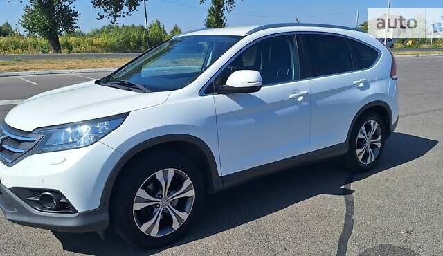 Белый Хонда СРВ, объемом двигателя 2.2 л и пробегом 238 тыс. км за 16500 $, фото 1 на Automoto.ua