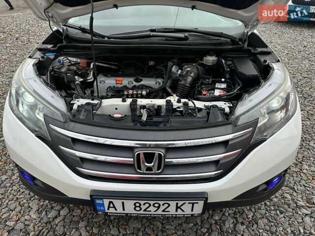 Белый Хонда СРВ, объемом двигателя 2.4 л и пробегом 185 тыс. км за 18000 $, фото 10 на Automoto.ua