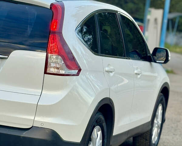 Хонда СРВ 2014 в Калуше на Automoto.ua Белый Хонда СРВ, объемом двигателя 1.6 л и пробегом 191 тыс. км за 14900 $, фото 20 на Automoto.ua
