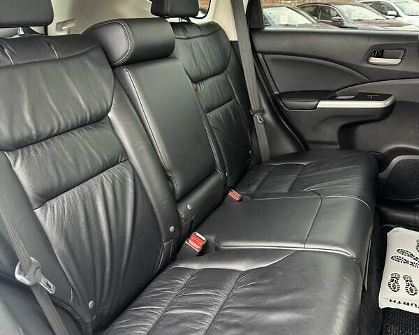 Белый Хонда СРВ, объемом двигателя 2.4 л и пробегом 185 тыс. км за 18000 $, фото 15 на Automoto.ua