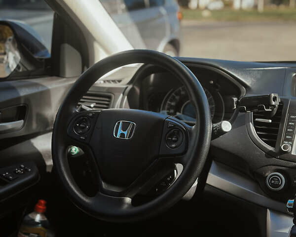 Хонда СРВ 2014 в Николаеве на Automoto.ua Белый Хонда СРВ, объемом двигателя 2.4 л и пробегом 116 тыс. км за 17300 $, фото 9 на Automoto.ua