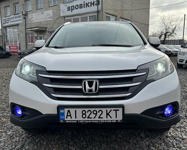 Белый Хонда СРВ, объемом двигателя 2.4 л и пробегом 185 тыс. км за 18000 $, фото 2 на Automoto.ua