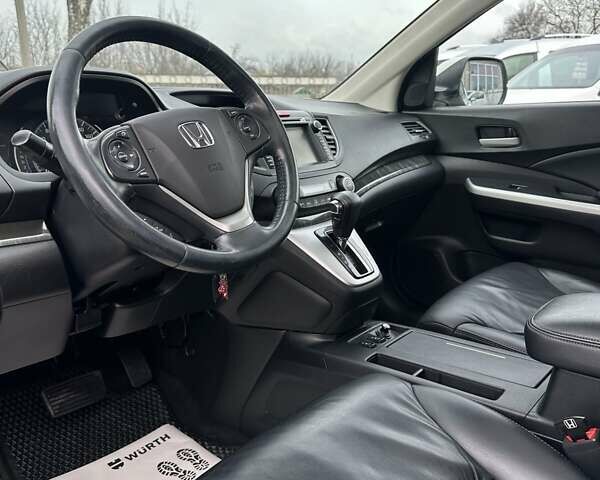 Белый Хонда СРВ, объемом двигателя 2.4 л и пробегом 185 тыс. км за 18000 $, фото 16 на Automoto.ua