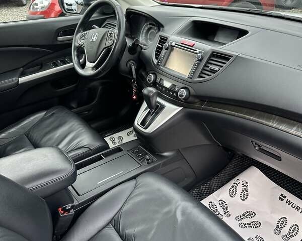 Белый Хонда СРВ, объемом двигателя 2.4 л и пробегом 185 тыс. км за 18000 $, фото 12 на Automoto.ua