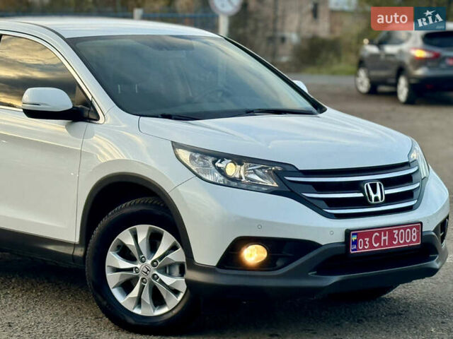 Хонда СРВ 2014 в Калуше на Automoto.ua Белый Хонда СРВ, объемом двигателя 1.6 л и пробегом 191 тыс. км за 14900 $, фото 14 на Automoto.ua