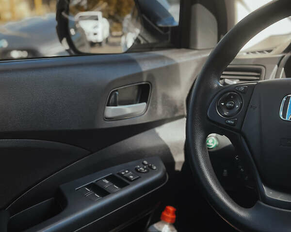 Хонда СРВ 2014 в Николаеве на Automoto.ua Белый Хонда СРВ, объемом двигателя 2.4 л и пробегом 116 тыс. км за 17300 $, фото 7 на Automoto.ua