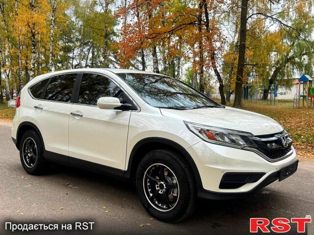 Белый Хонда СРВ, объемом двигателя 2.4 л и пробегом 164 тыс. км за 14900 $, фото 1 на Automoto.ua