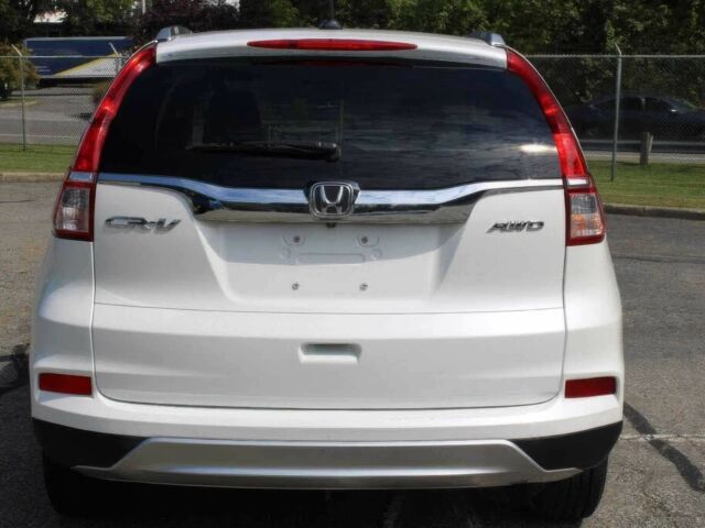 Белый Хонда СРВ, объемом двигателя 2.4 л и пробегом 73 тыс. км за 6800 $, фото 4 на Automoto.ua