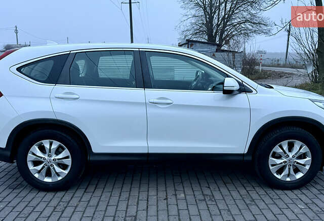 Белый Хонда СРВ, объемом двигателя 1.6 л и пробегом 176 тыс. км за 15800 $, фото 1 на Automoto.ua