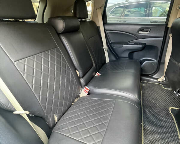 Белый Хонда СРВ, объемом двигателя 2.36 л и пробегом 160 тыс. км за 16100 $, фото 4 на Automoto.ua
