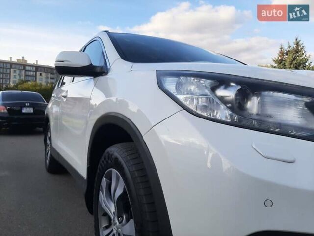 Белый Хонда СРВ, объемом двигателя 2 л и пробегом 195 тыс. км за 17800 $, фото 10 на Automoto.ua