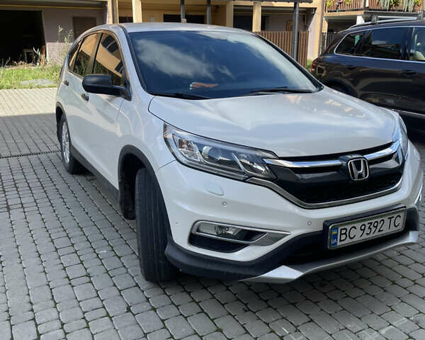 Белый Хонда СРВ, объемом двигателя 2.36 л и пробегом 160 тыс. км за 16100 $, фото 2 на Automoto.ua