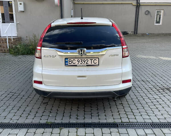 Белый Хонда СРВ, объемом двигателя 2.36 л и пробегом 160 тыс. км за 16100 $, фото 3 на Automoto.ua