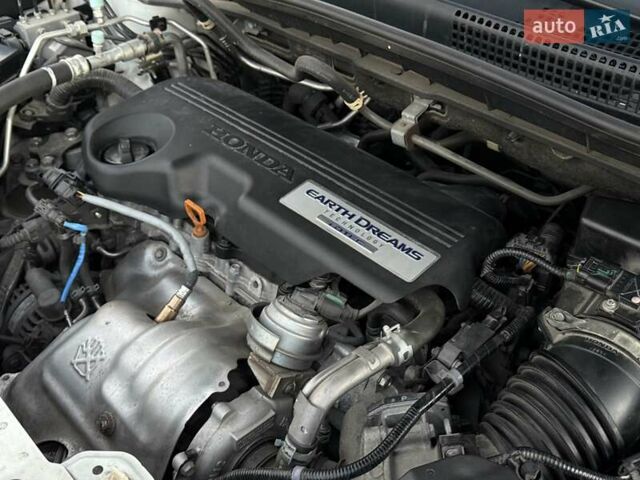 Белый Хонда СРВ, объемом двигателя 1.6 л и пробегом 176 тыс. км за 17890 $, фото 66 на Automoto.ua