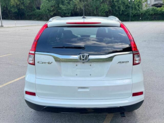 Белый Хонда СРВ, объемом двигателя 2.4 л и пробегом 72 тыс. км за 10000 $, фото 4 на Automoto.ua