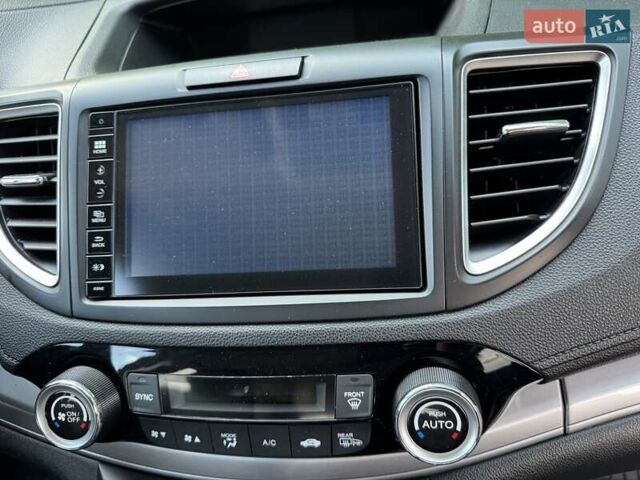 Хонда СРВ 2015 в Киеве на Automoto.ua Белый Хонда СРВ, объемом двигателя 2.36 л и пробегом 99 тыс. км за 19500 $, фото 24 на Automoto.ua