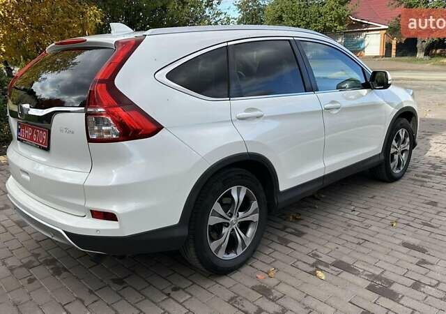 Хонда СРВ 2016 в Бершаде на Automoto.ua Белый Хонда СРВ, объемом двигателя 1.6 л и пробегом 136 тыс. км за 21950 $, фото 11 на Automoto.ua