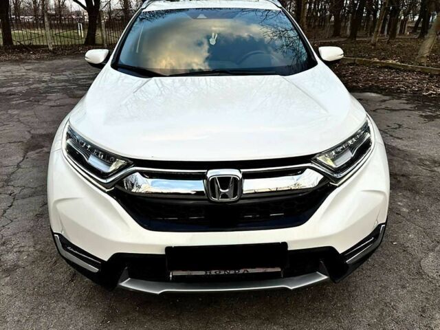 Белый Хонда СРВ, объемом двигателя 1.5 л и пробегом 101 тыс. км за 16300 $, фото 1 на Automoto.ua