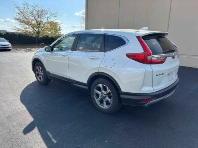 Белый Хонда СРВ, объемом двигателя 1.5 л и пробегом 64 тыс. км за 14000 $, фото 7 на Automoto.ua