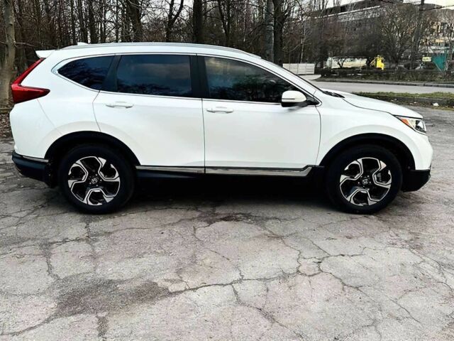 Белый Хонда СРВ, объемом двигателя 1.5 л и пробегом 101 тыс. км за 16300 $, фото 3 на Automoto.ua