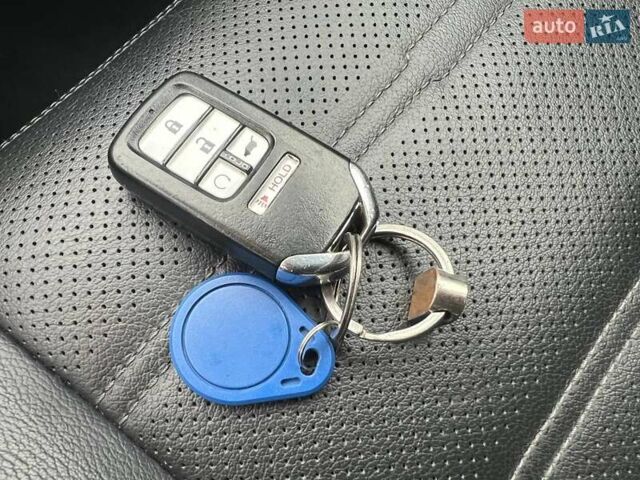 Белый Хонда СРВ, объемом двигателя 1.5 л и пробегом 178 тыс. км за 21200 $, фото 12 на Automoto.ua