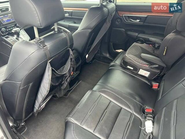 Белый Хонда СРВ, объемом двигателя 1.5 л и пробегом 178 тыс. км за 21200 $, фото 1 на Automoto.ua